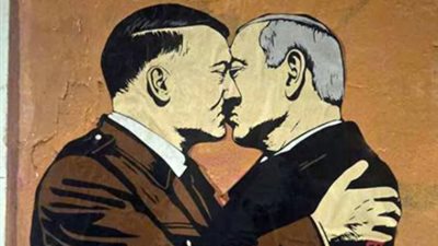 جدارية تثير رعب الاحتلال الإسرائيلي، لوحة نتنياهو وهتلر وجهان لعملة واحدة (صور)