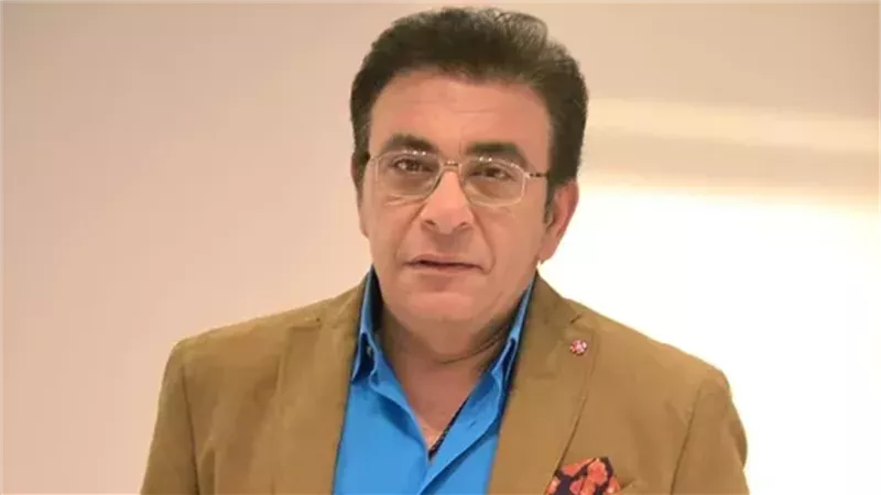 المذيع عاطف كامل