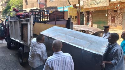 بالصور، حملات مكثفة لإزالة التعديات على الطرق العامة بمحافظة الجيزة